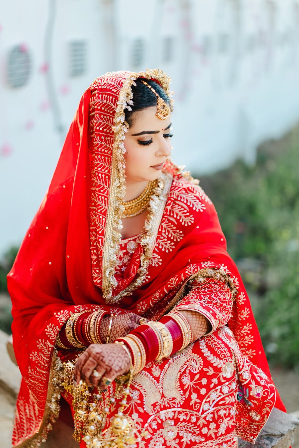 A close bridal portrait in soft natural light, eyes closed